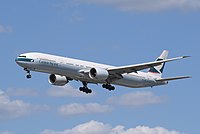 Cathay Pacific Boeing 777-300ER (B-KQC) arrives London Heathrow 7Jun2015 arp.jpg