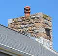 Witches' stones on modern roof Jersey.jpg