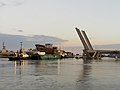 "City of Adelaide" moving thru open Port River bridges.jpg